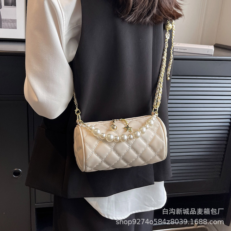 New summer single shoulder womens new pearl chain handbag simple and fashionable designer crossbody bag trendy cylindrical bag niche popular handbag c