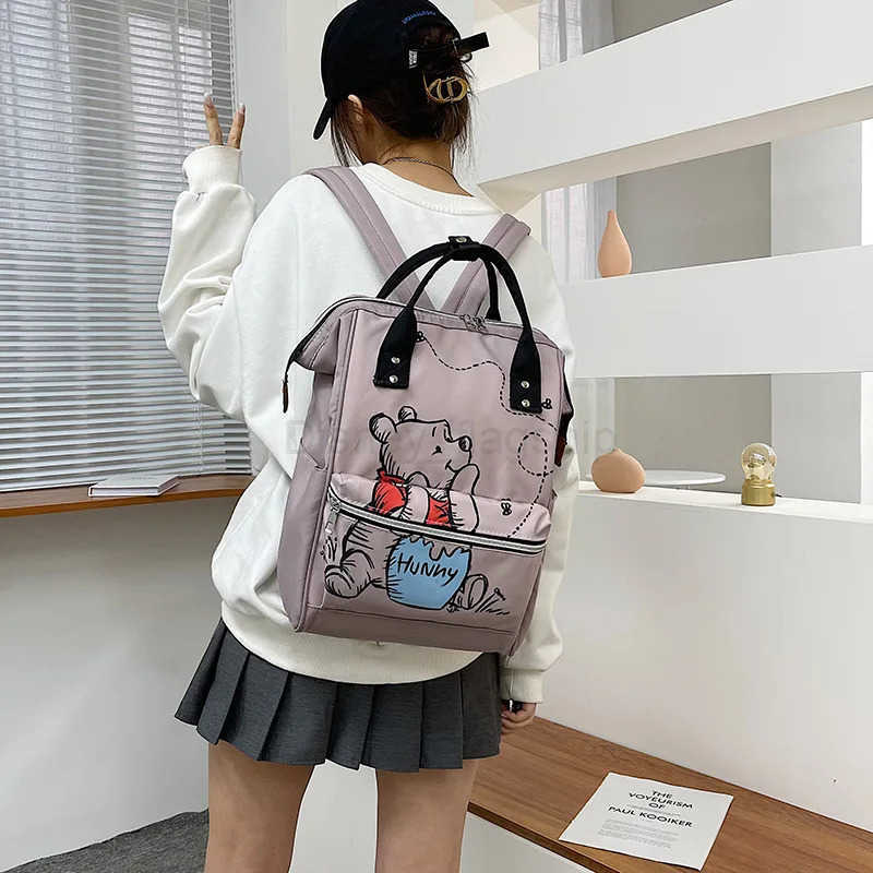 Disney 2025 New Winnie The Pooh Diaper Bag Backpack Cartoon Cute Mother and Baby Bag Large Capacity Lightweight Travel Mommy BagXJ250515