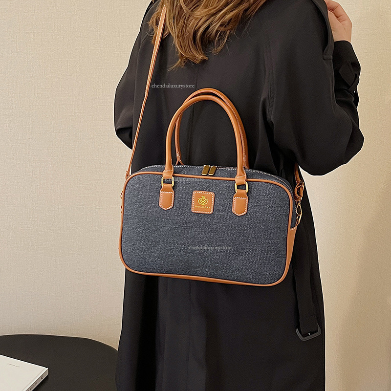 2025 Women's Premium Shoulder Bag Free Shipping Designer Bag Bridal Cowboy Splicing Comparison Crossbody Bag Phone Key Storage Small Square Bag S
