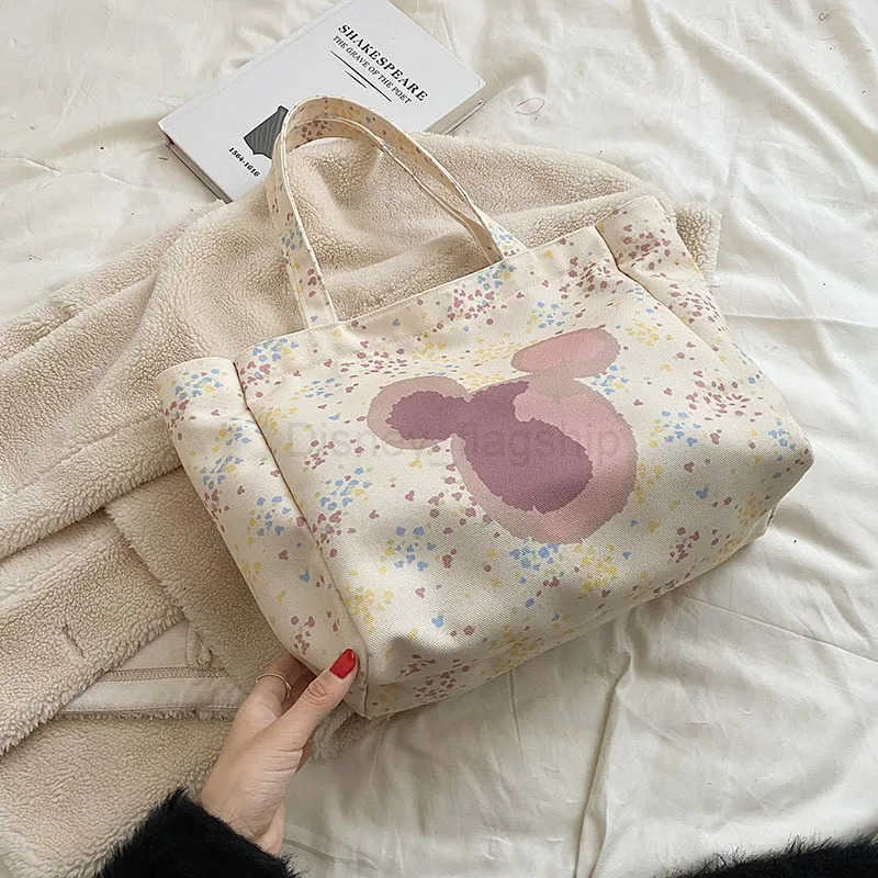 Disney New Womens Canvas Handbag Large Capacity Shoulder Bag Cute Armpit Mommy Niche Shopping BagXJ250515