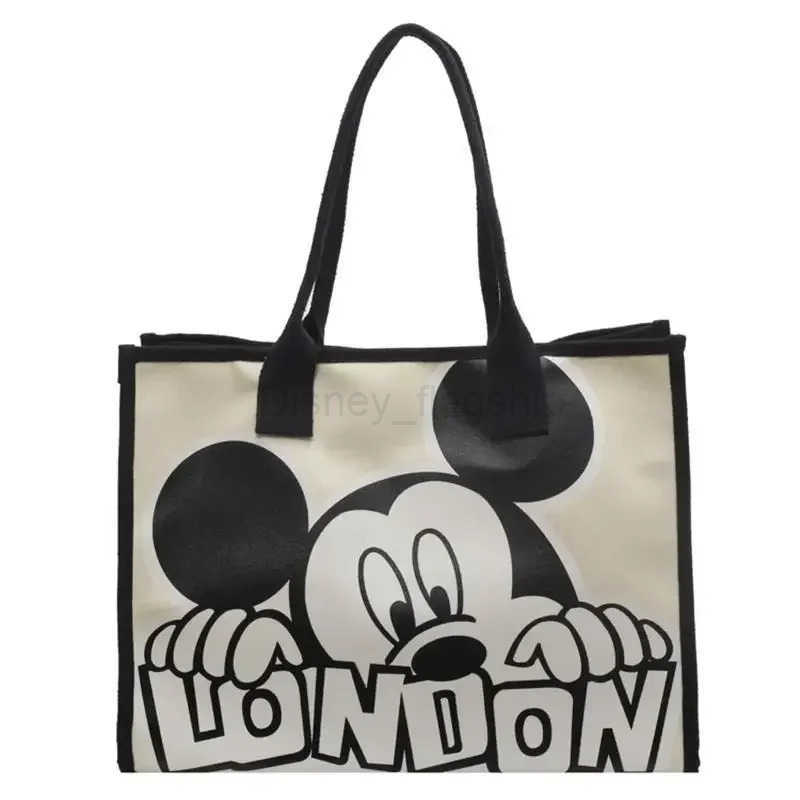 Disney New Disney Mickey Canvas Bag Womens Versatile Casual Shoulder Bag Commuter Handbag Large Capacity Multifunctional Mommy BagXJ250515