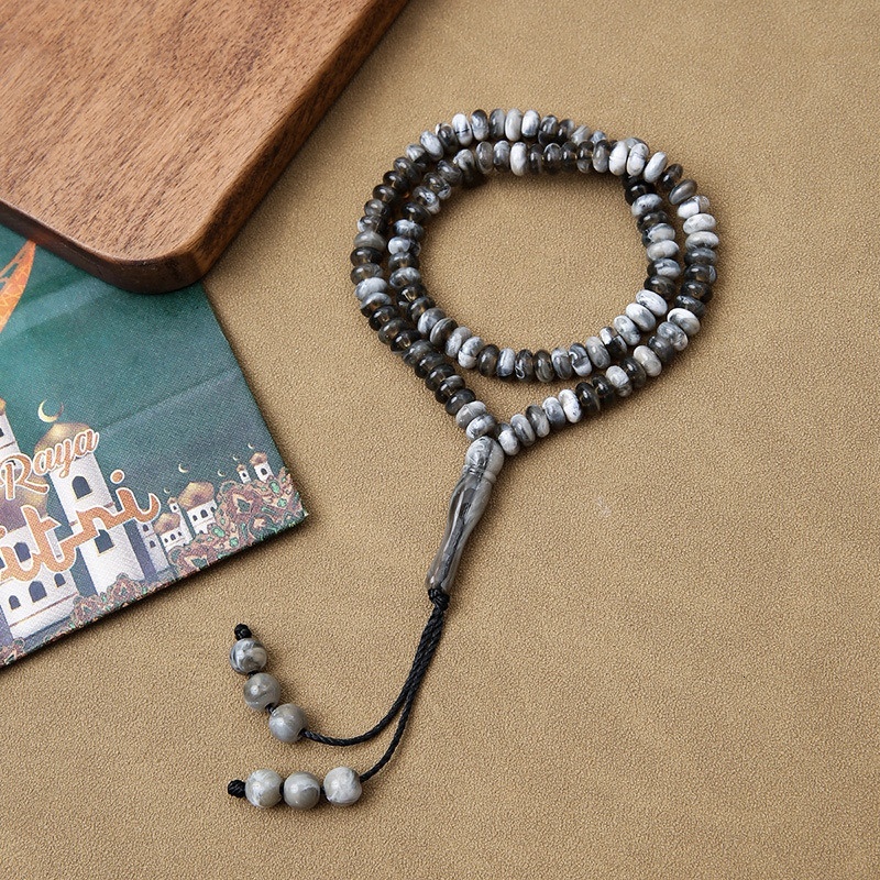 Tisbiha 99 prayer praise beads, holding Arabic bracelets, Muslim jewelry