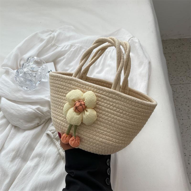 New Physics New 2025 Summer Handheld Women's Designer Fashion Retro Versatile Multi functional Niche Design Casual Woven Bag Underarm Bag