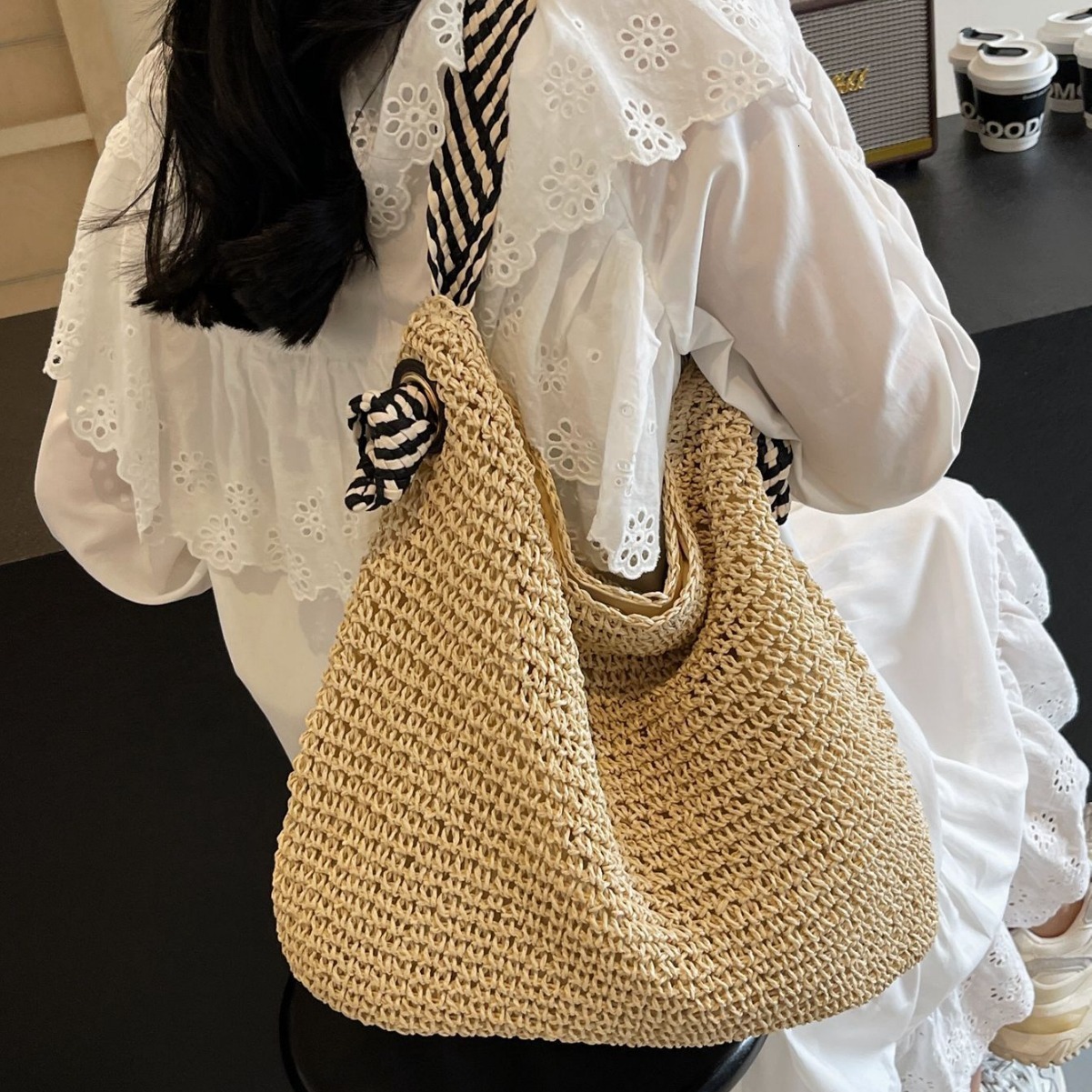 High quality new bag for vacation beach grass ladies 2025 designer new lazy style woven bag, large capacity fashionable single shoulder armpit bag