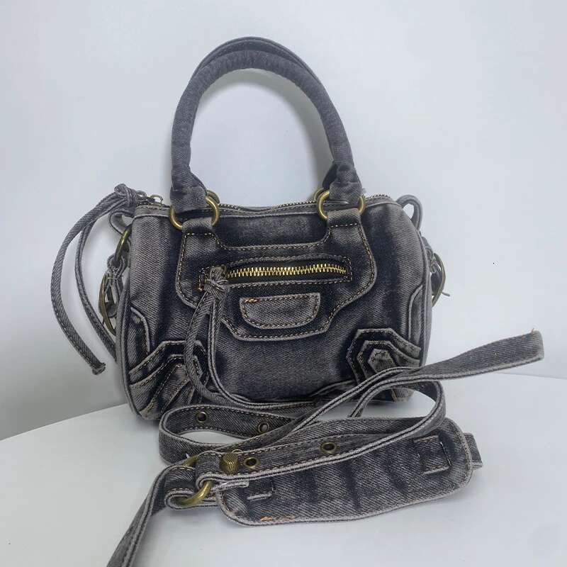 new for women high-end denim motorcycle tassel rivets fashionable wash water canvas women's bag