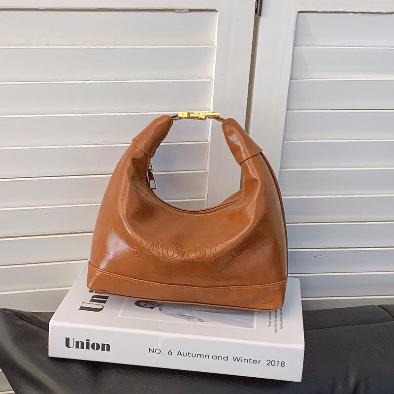 Free Delivery Designer Bag 2025 Winter New French Fashion Simple Solid Color Niche Design Armpit Shoulder Hand Dumpling Luxury Bag