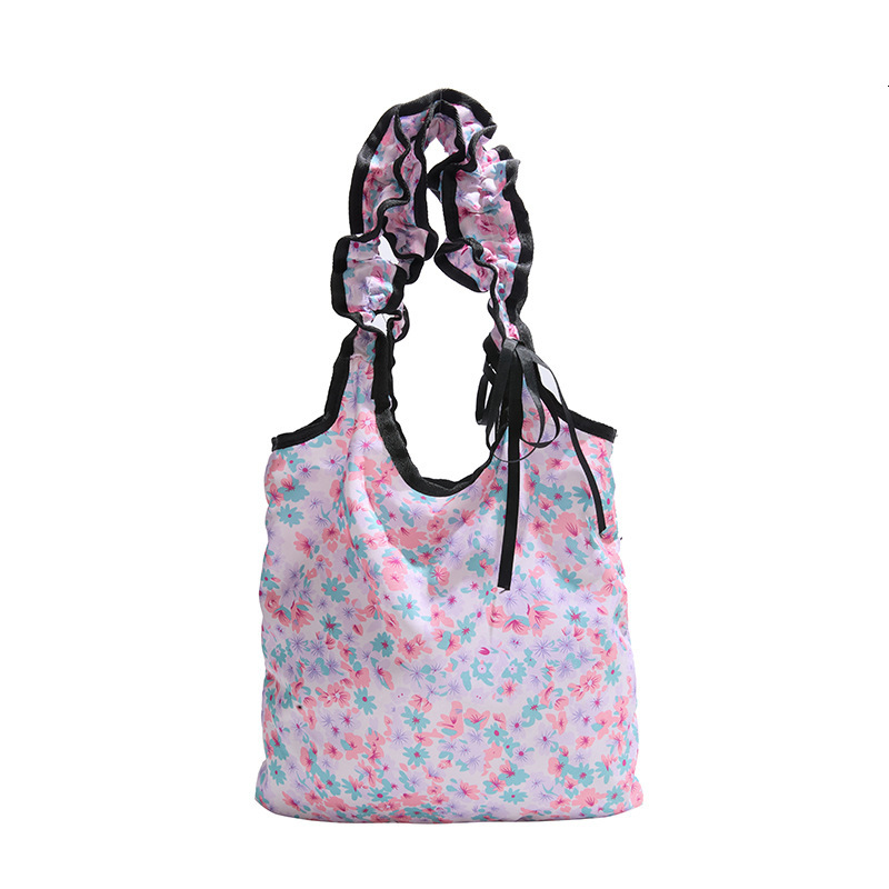 2025 New Sweet And Cute Folded Shoulder Summer Small Fresh Wave Point Bow Luxury Bag Cloth New Free Delivery Designer Bag Commuter Bag For Women