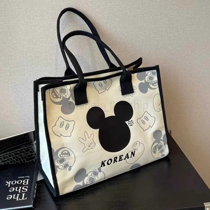 Disney 2024 New Mickey and Minnie Canvas Shoulder Bag Commuter Fashion Tote Bag Large Capacity Handbag Mommy BagXJ250515