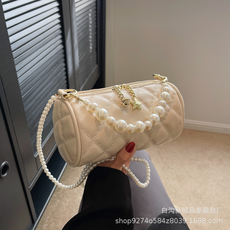 New summer single shoulder womens new pearl chain handbag simple and fashionable designer crossbody bag trendy cylindrical bag niche popular handbag c