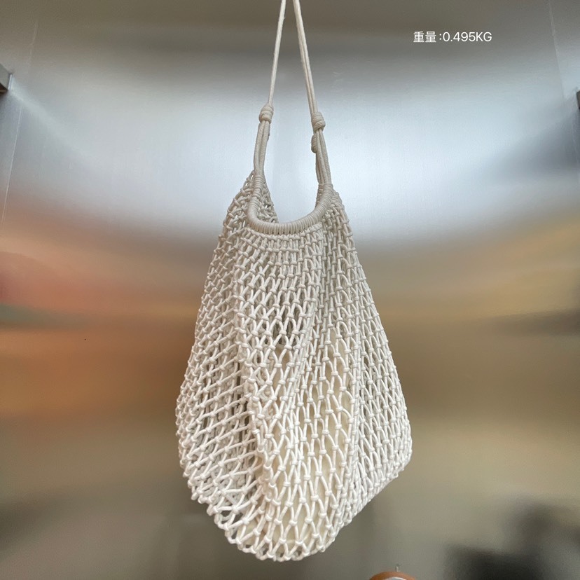2025S designer hollow women grass new internet famous large capacity seaside vacation woven casual shoulder tote baozi mother bag