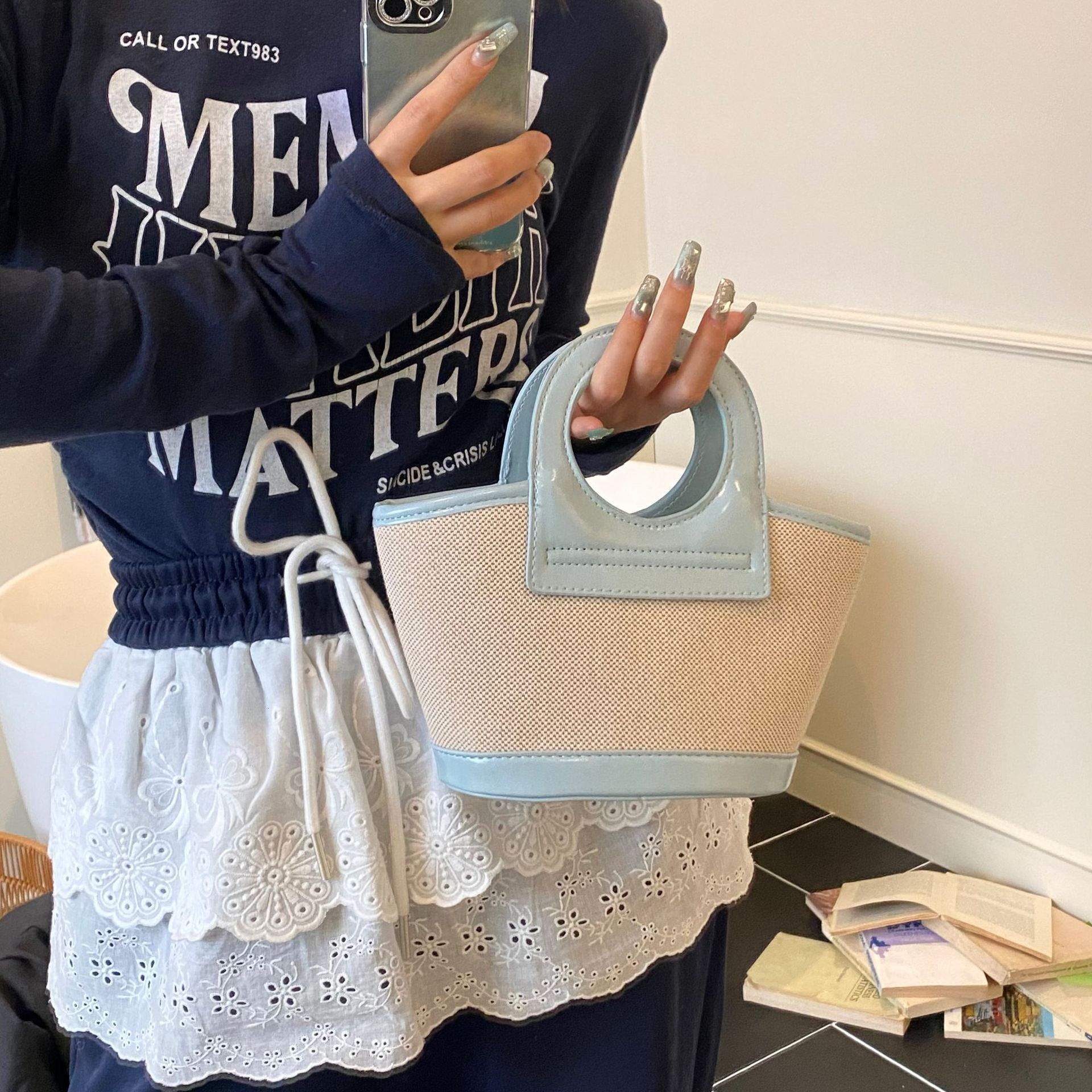 New bag, Korean fashion niche female handheld vegetable basket designer, 2025 new multifunctional commuting shoulder bag, small fresh crossbody bag