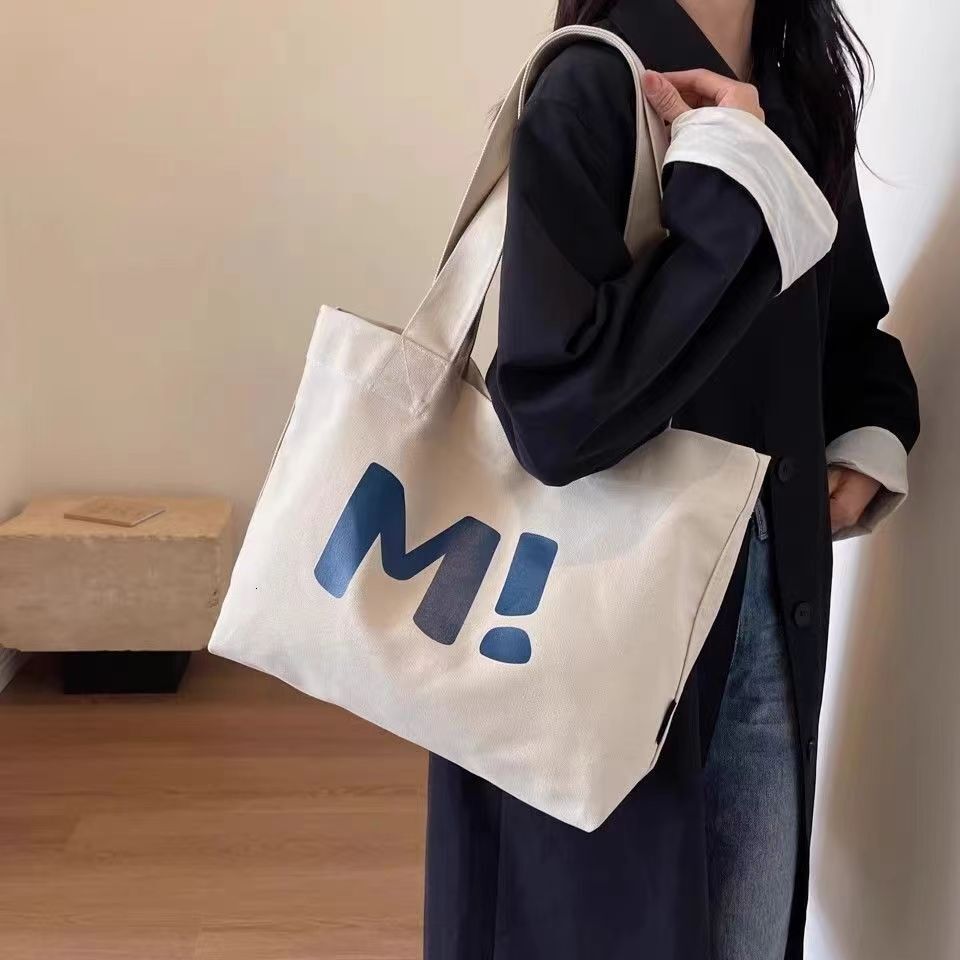 Canvas for women, large capacity, sturdy supermarket shopping bag, simple and versatile. 2024 new single shoulder tote bag