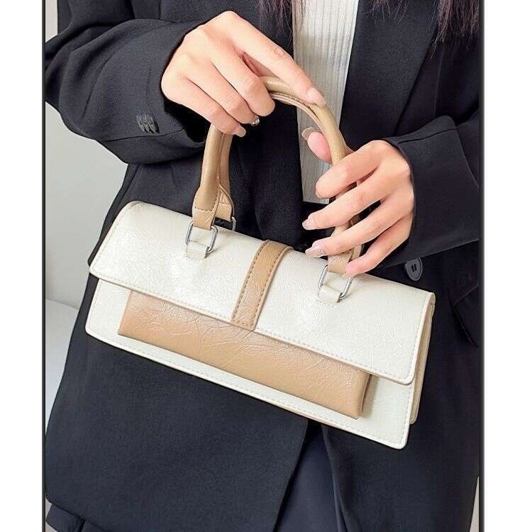 Niche 2025 new high-end crossbody handbag shoulder motorcycle ins Japanese Korean French stick bag