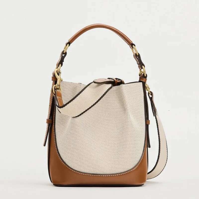 New women's brown pleated drawstring versatile hand-held bucket wide shoulder strap diagonal cross bag