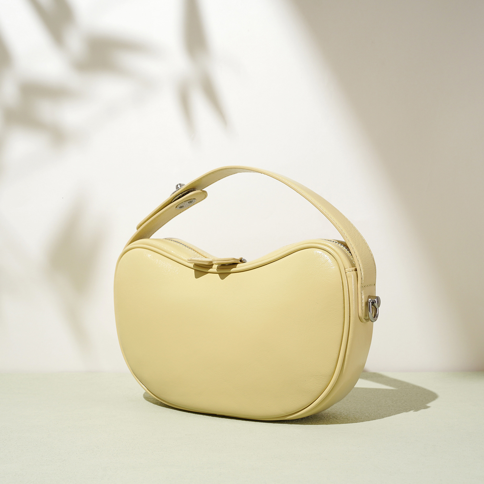 2025S designer pea sheepskin fashionable cashew niche design shoulder temperament high-end mother and child crossbody women bag