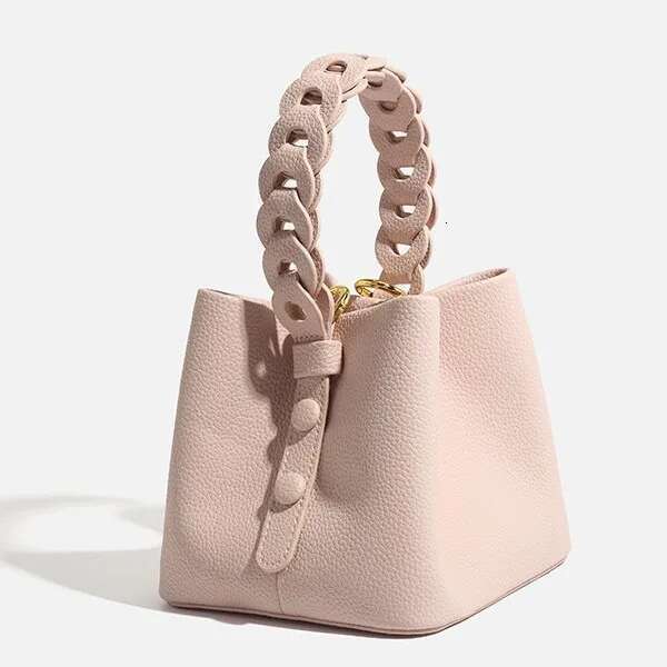 New Hollowed Out Hand-Held Soft Leather Lychee Pattern Drawstring Bucket Bag, Fashionable And Versatile Women's Bag