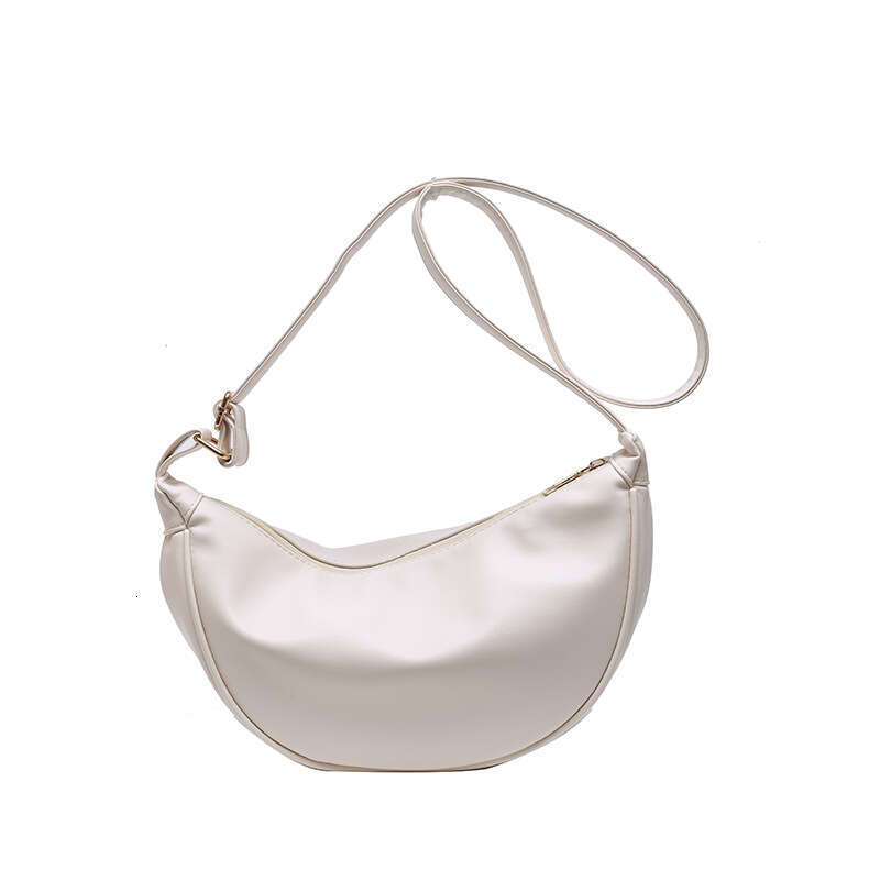 New western-style women's bag with fashionable texture, crossbody armpit bucket Japanese and Korean soft leather, solid color, single shoulder du