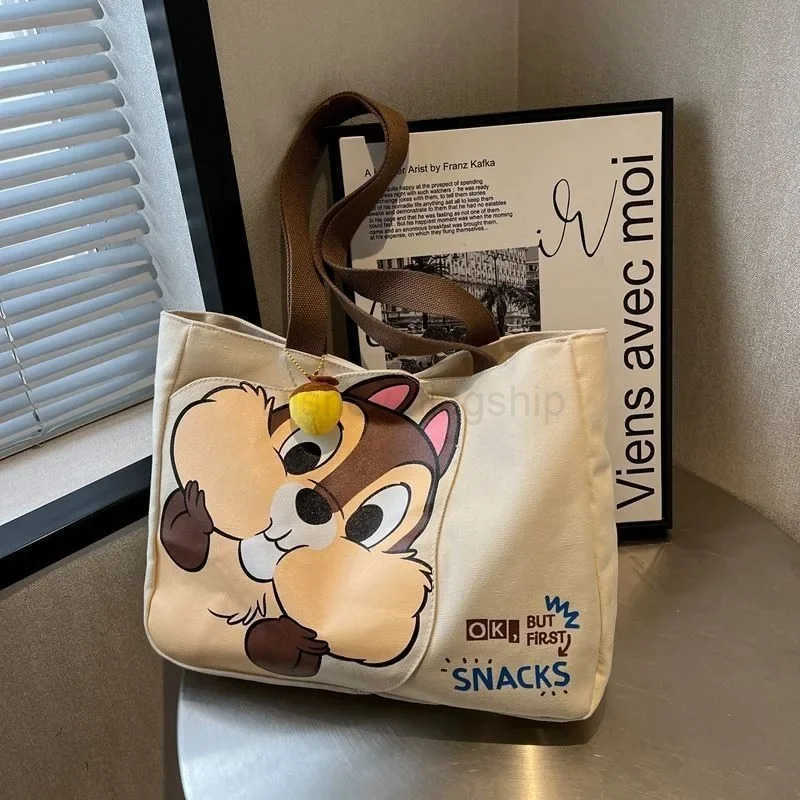 Disney New Womens Canvas Bag Large Capacity New Cartoon Chichititi Handbag Mummy Bag Fashion Shoulder Bag Casual BackpackXJ250515