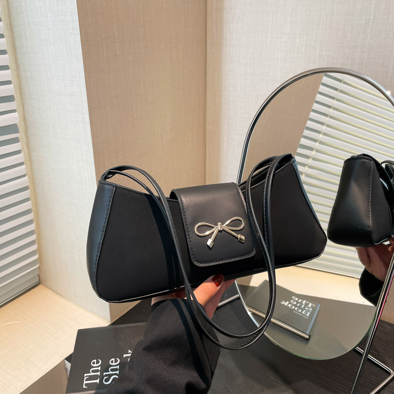 Free Delivery Designer Bag Popular Niche Bow Women's 2025 Winter New Versatile Hand Texture Stick Single Shoulder Armpit Luxury Bag