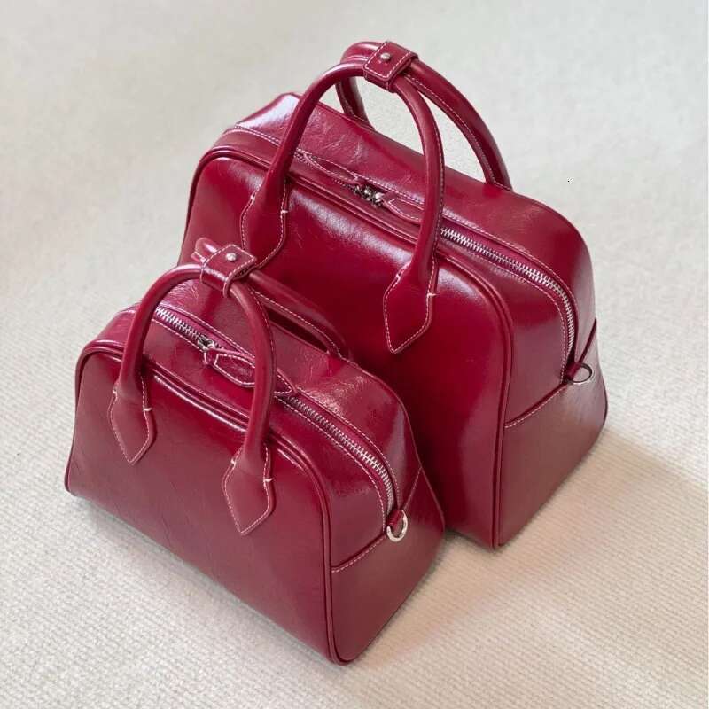 High Quality Designer Bags New Korean Niche Design Boston First Layer Cowhide Large Capacity Casual Portable Shoulder Crossbody Armpit Bag Luxury Bag