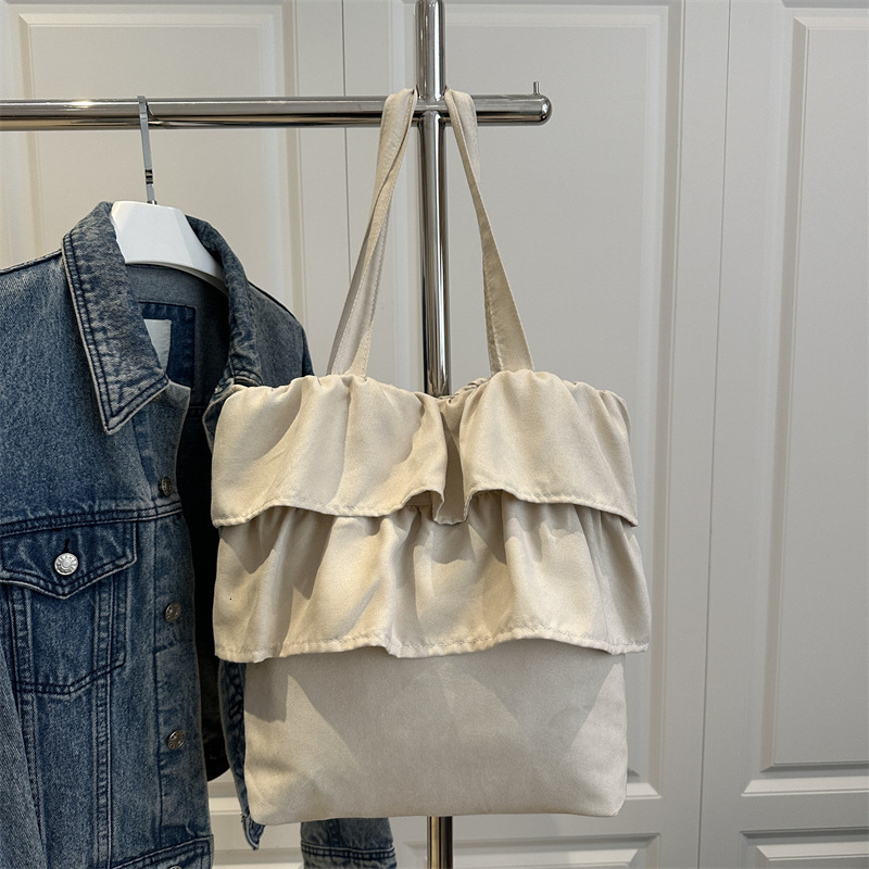 2025 Girls' Spring New New Free Delivery Designer Bag Pleated Ballet Style Multilayer Skirt Design One Shoulder Luxury Bag Handheld Tote Bag Supe