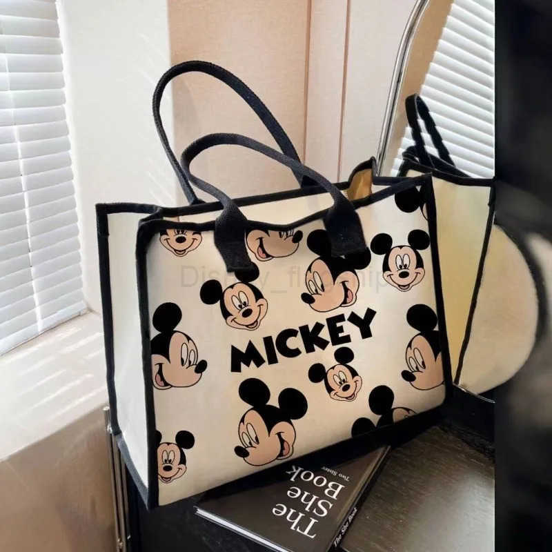 Disney New Large Capacity Cartoon Canvas Bag Womens 2024 New Fashion Outing Portable Shopping Bag Mommy Shoulder Tote BagXJ250515