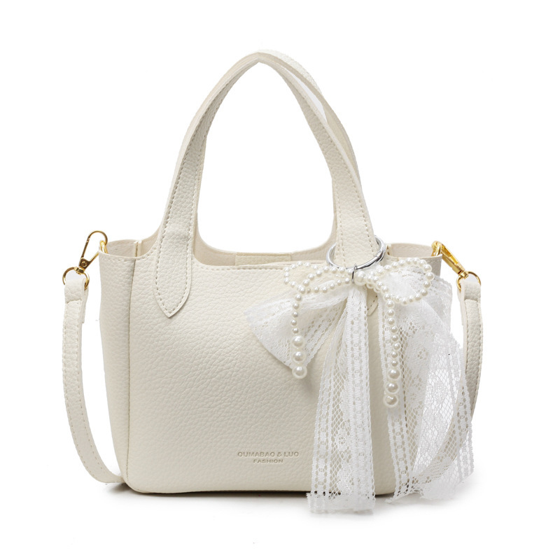 New high-end women's simple handbag for spring and summer with lychee pattern bow and ribbon designer single shoulder crossbody bag commuting sol