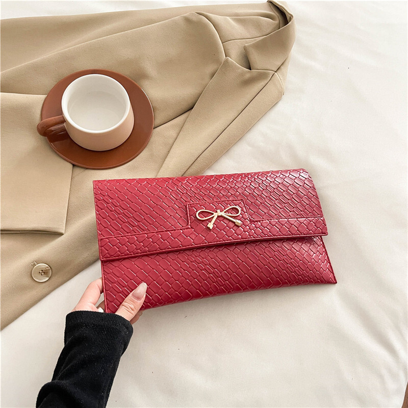 2025 New Urban Simple Fashion Trendy Bow New Free Delivery Designer Bag Luxury Bag Stone Pattern Bright Face Single Shoulder Underarm Small Square Wom
