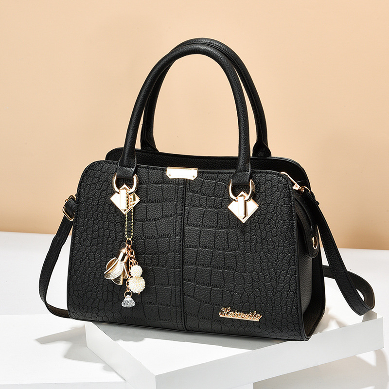 Top quality Brand High Quality New Style Free Delivery Designer Bag Middle aged fashionable women's handbag Korean version simple mother shoulder