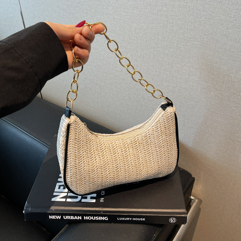 Summer New New Free Delivery Luxury Bag Designer Bag Versatile Fashion Grass Weaving Stick Underarm Simple Artistic Single Shoulder Handheld Crossbody
