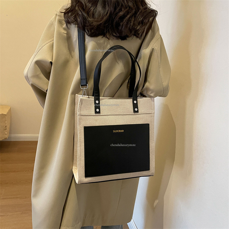 2025 Designer Bag Women's Large Capacity Comparison Canvas Upright Handbag New Letter Imprinted Commuter Shoulder Crossbody Bag Student Shopping 