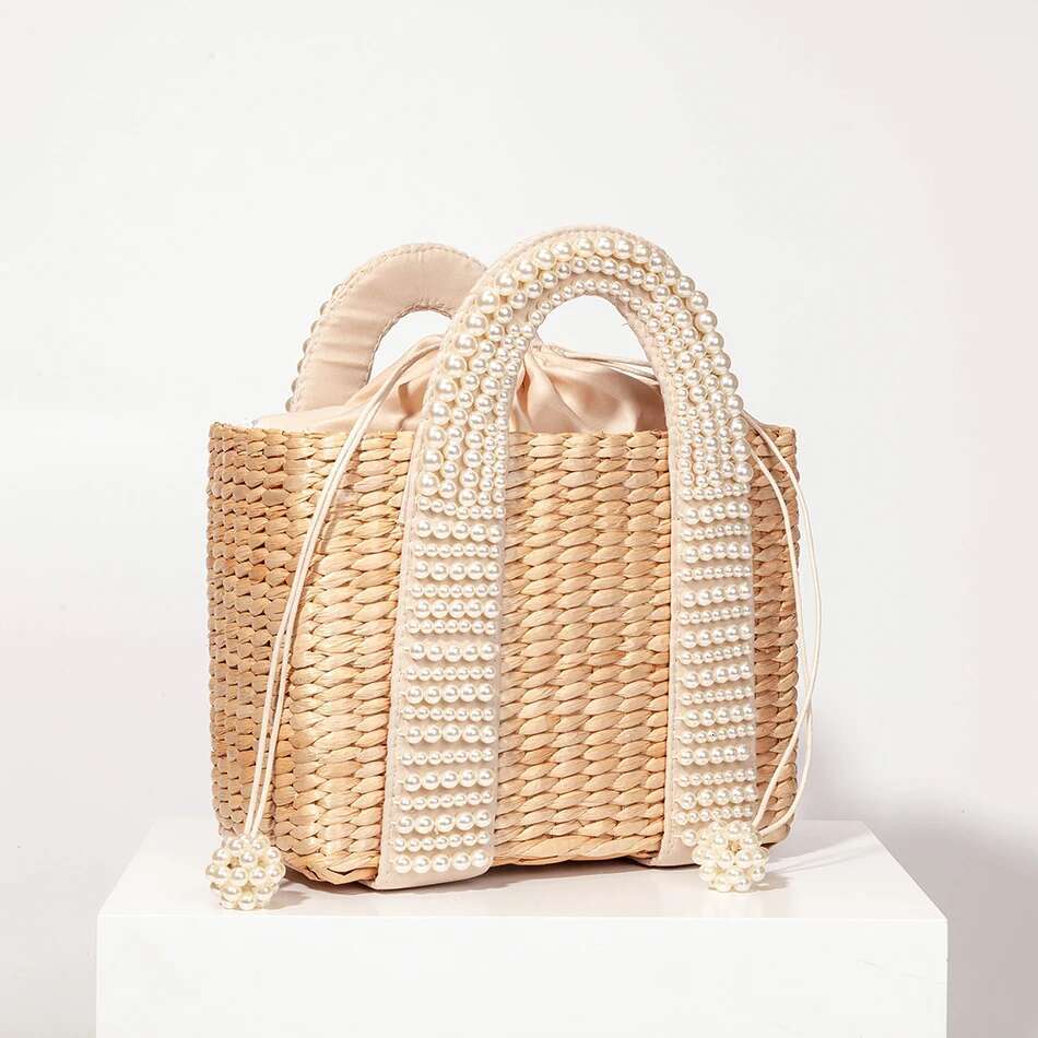 2025 Free Shipping New Women's Designer Elegant Knitted Beaded Straw Bag Women's Bohemian Knitted Large Handbag Holiday Leisure Beach Bag