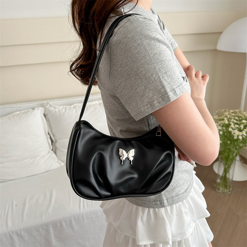 Free shipping on 2025 new designer bags Fashion bow niche underarm bag women's pleated handbag popular versatile and stylish shoulder bag