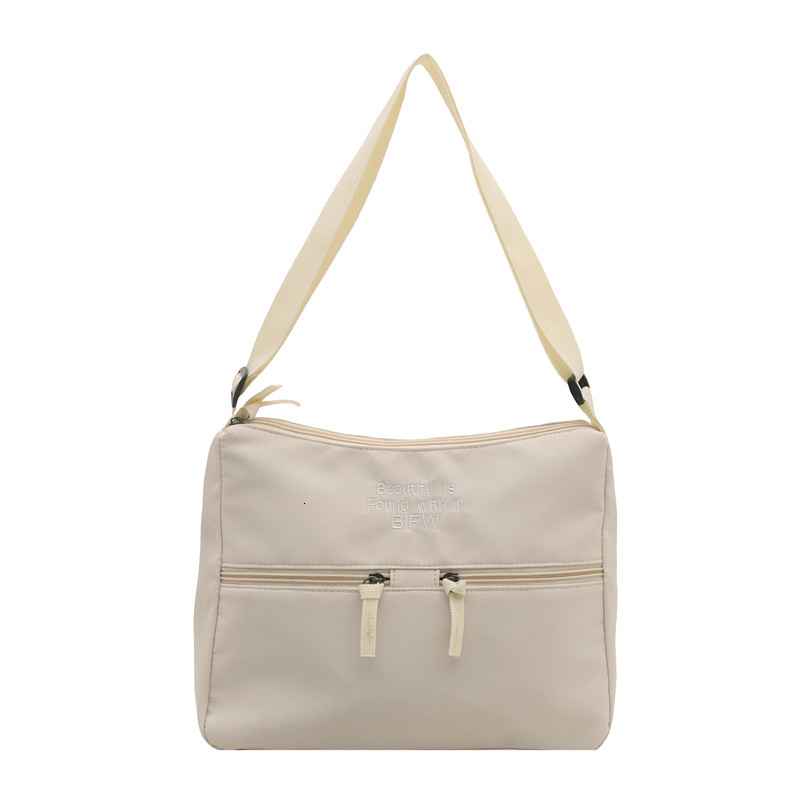 2025 Spring New Casual Lightweight Cloth Japanese Style New Free Delivery Designer Luxury Bag Bag Solid Color Simple Letter Embroidered Shoulder Bag