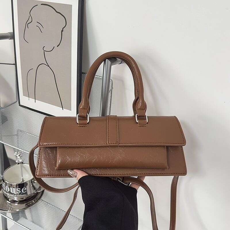 Niche 2025 new high-end crossbody handbag shoulder motorcycle ins Japanese Korean French stick bag