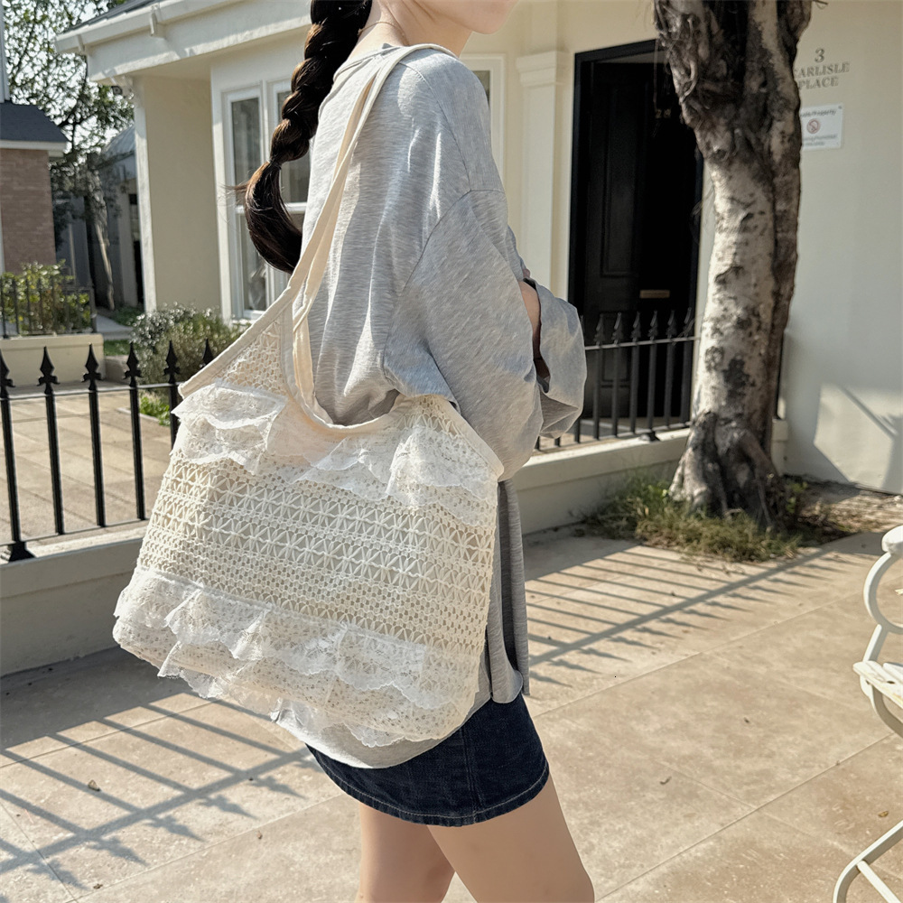 2025 new spring and summer leisure vacation fairy shaped lace mesh underarm large capacity single shoulder women's bag beach vacation bag trend h