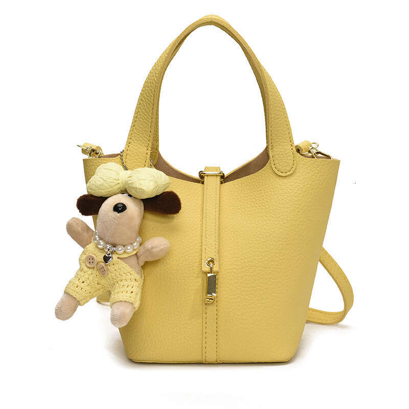 Fashionable Western vegetable basket water bucket for women 2025 solid color lychee pattern niche single shoulder crossbody bag new style temperament 