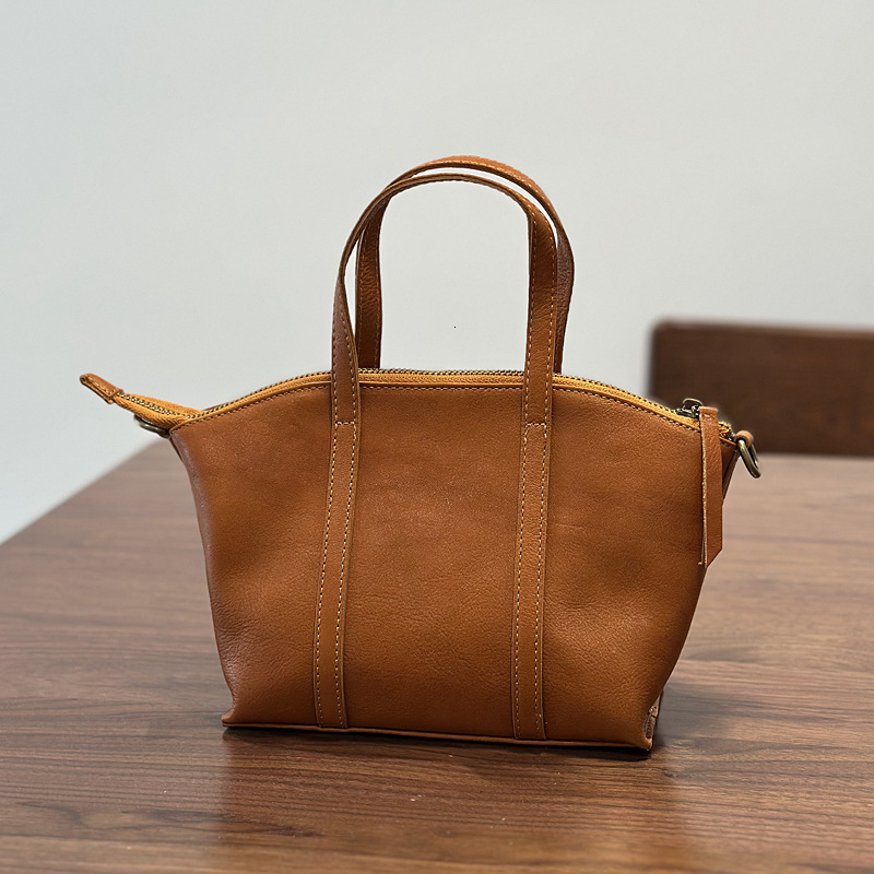 2025S designer mini shell genuine women top layer cowhide shoulder crossbody bag vegetable tanned leather Korean version artistic handbag soft