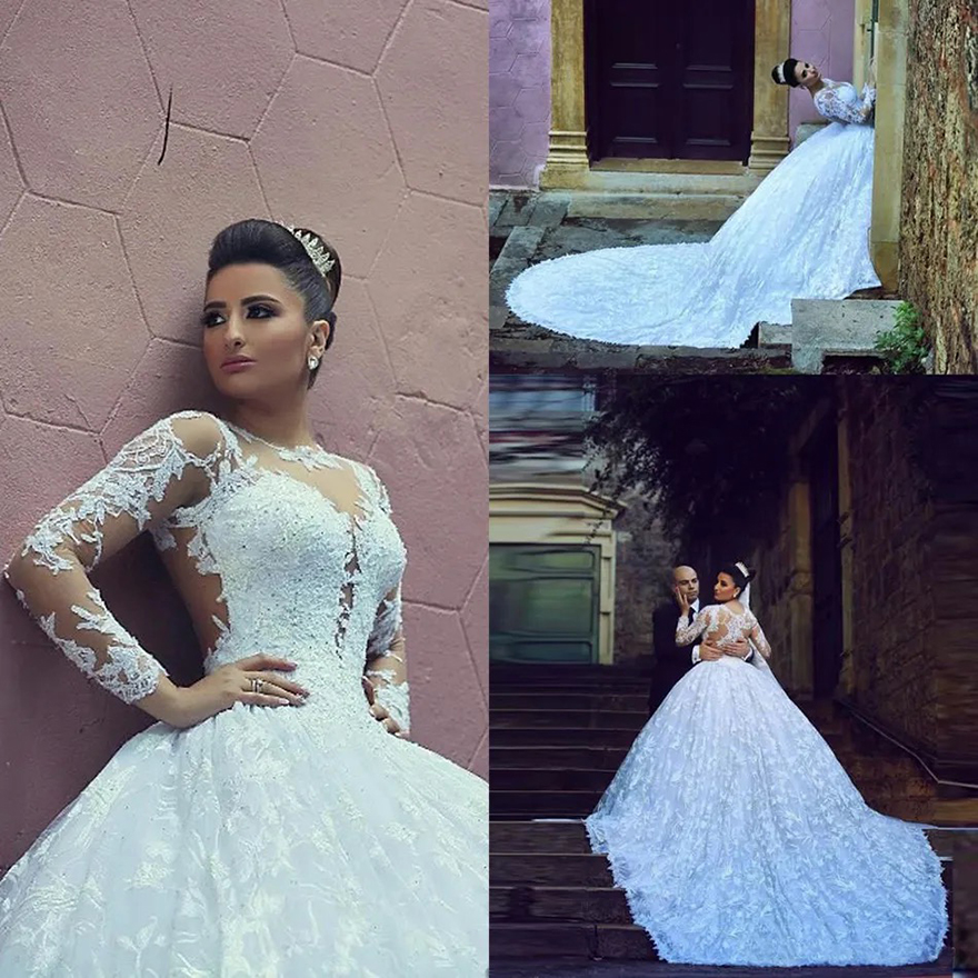 Luxury Arabic Dubai Sheer Jewel Neck Lace Ball Gown Wedding Dresses Princess Appliques Illusion Long Sleeves Bridal Gowns Vestidos De Festa