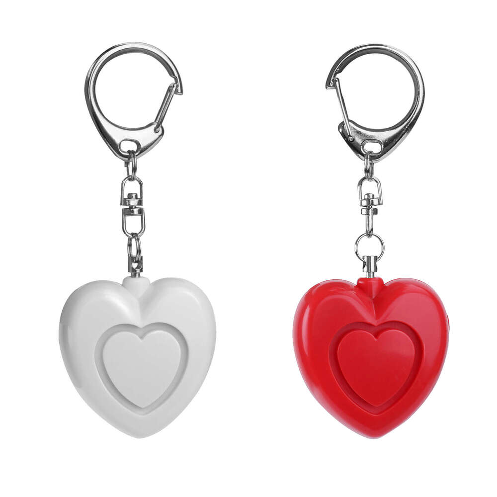 Hot selling heart-shaped device, electronic gift, keychain, personal alarm, female anti wolf alarm