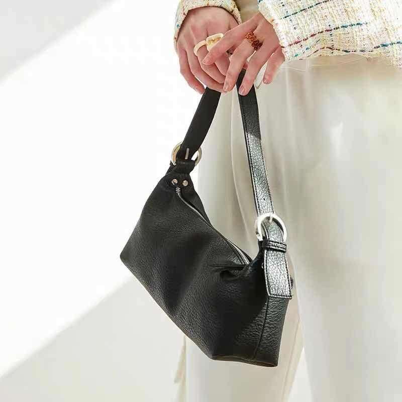 High end versatile armpit soft leather small women's dumpling 2025 autumn and winter French niche crossbody crescent bag