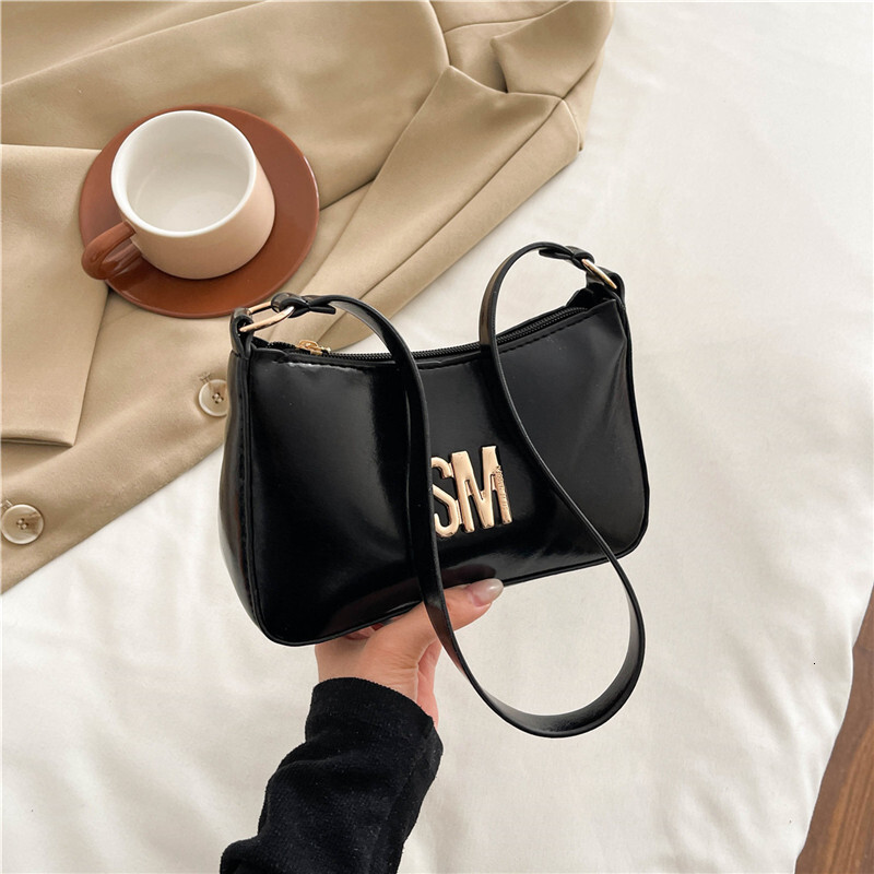 Western Women's 2025 Luxury Bag Summer New Style Texture Popular Letter Commuting Handheld New Free Delivery Designer Bag Crossbody Bag Trend