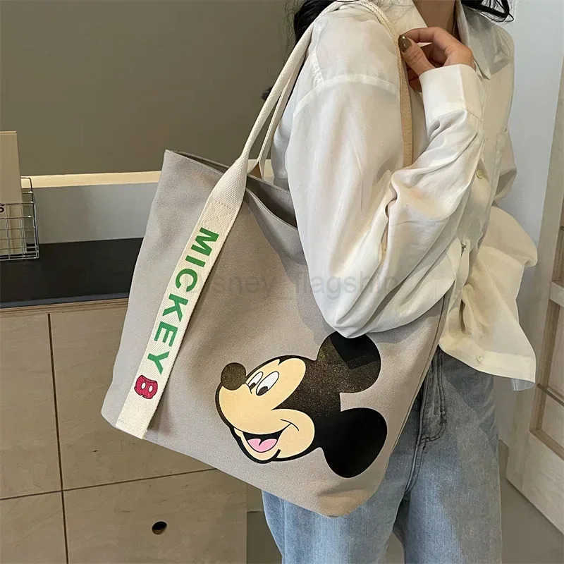 Disney Mickey Mouse New Large Capacity Cute Canvas Shoulder Bag Womens Cartoon handbag Cute storage Tote Bag Fashion MummyXJ250515