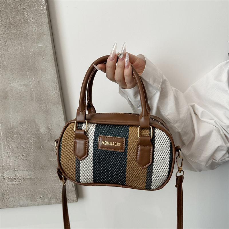 New bag texture striped contrast handheld 2025 new designer high-end retro Boston shoulder crossbody bag simple and fashionable