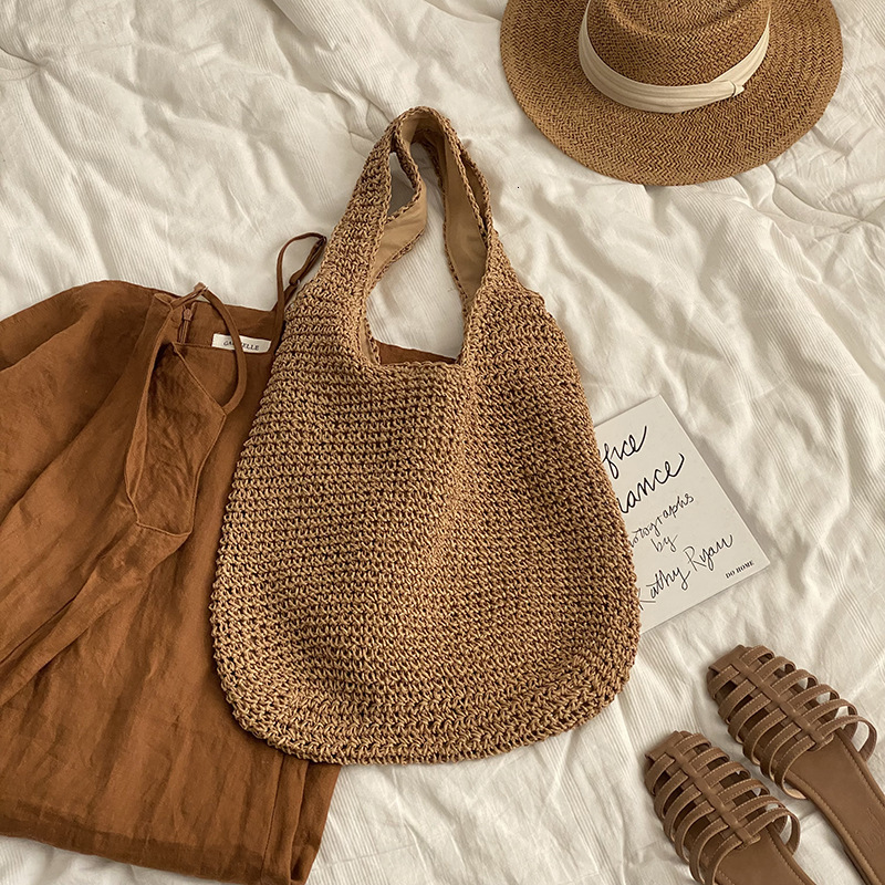 New single shoulder large capacity women's summer canvas beach vacation bag woven bag casual designer fashionable lazy style hand-held woven bag 