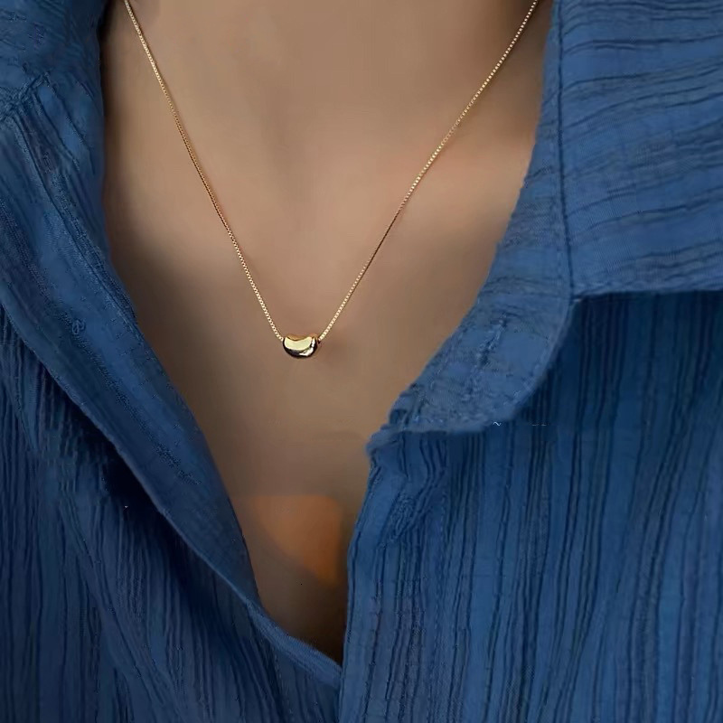 Simple temperament gold bean necklace womens new collarbone chain light luxury high-end neck chain accessory 241021