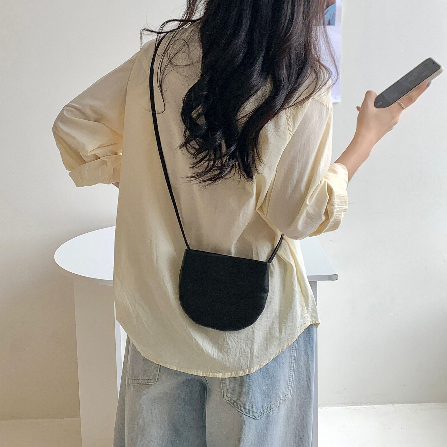 2025S designer summer new simple hanging neck Korean trendy small women crossbody versatile semi-circular mini bag