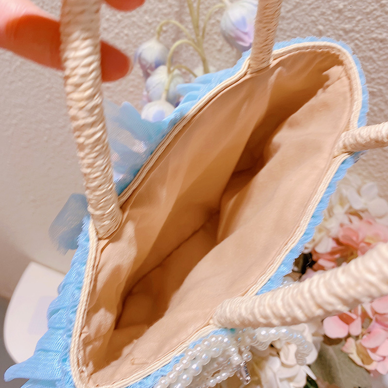 2025S designer ocean blue lace woven women beach vacation style handbag bucket bag