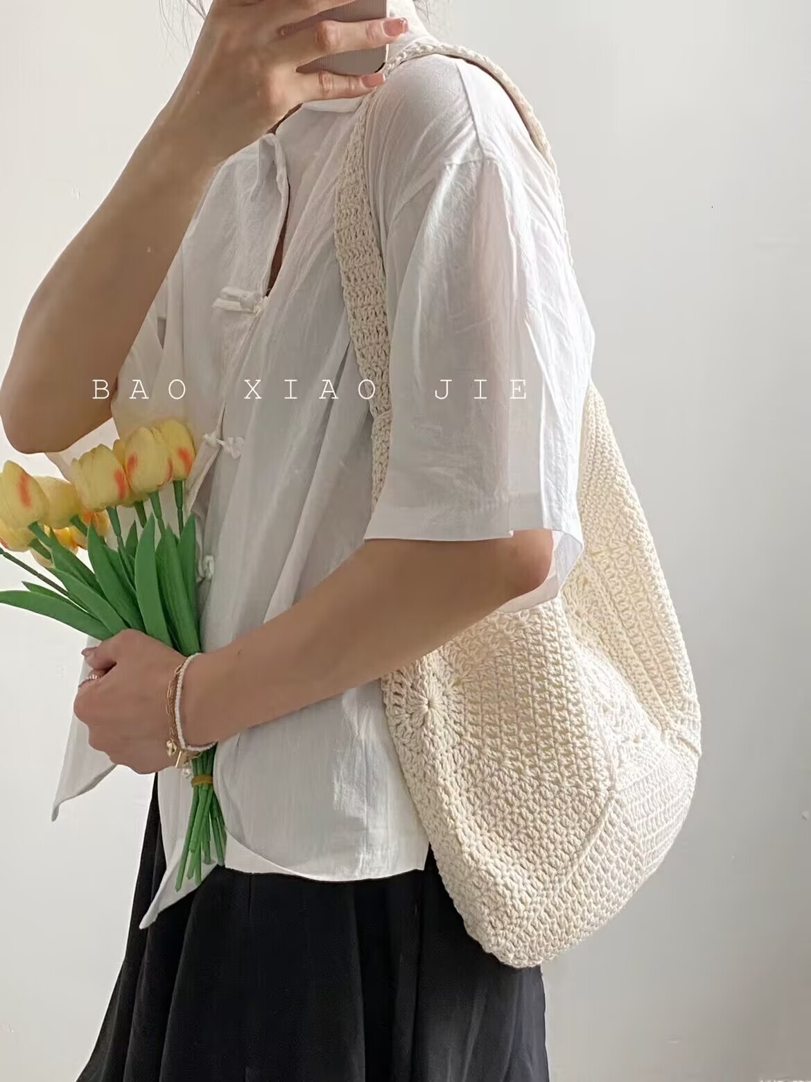 2025S designer high-end sense shoulder large capacity cotton thread new grandmother grid grass woven vacation beach versatile women bag