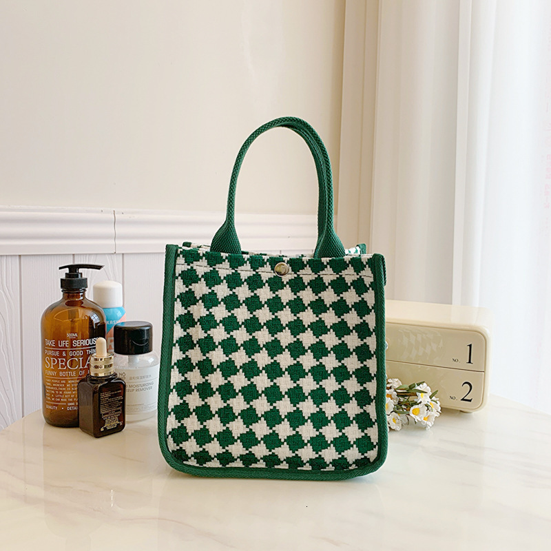 2025S designer new style outdoor women high-end sense niche tote bag work commuting handbag fashionable carrying strap